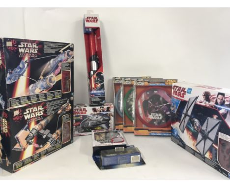 Star Wars collection of 10 boxed items, including Darth Vader lightsaber..Pod Racers..Tie Fighter..3x clocks etc.. No Reserve