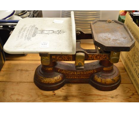 Gardner &amp; Sons, a set of cast iron and porcelain scales.