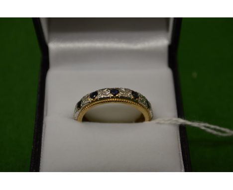 A 9ct gold, diamond and sapphire eternity ring, size Q.