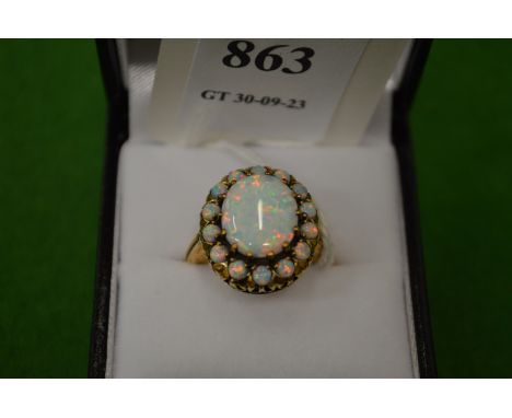 A 9ct gold and opal cluster ring, size O.