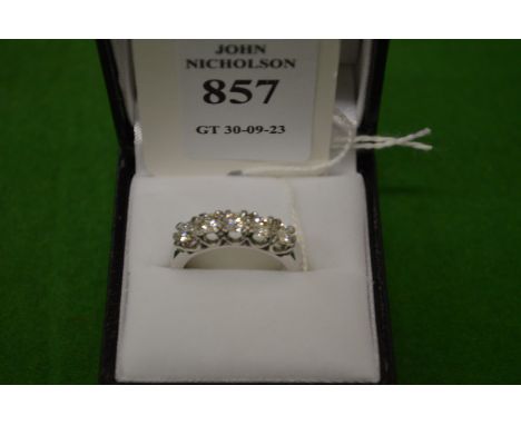 A good 18ct white gold and diamond five stone ring, size O.