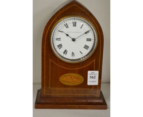 An Edwardian mahogany mantle clock.