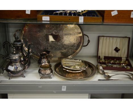 A large plated twin handle tray four piece tea and coffee service and other plated items.