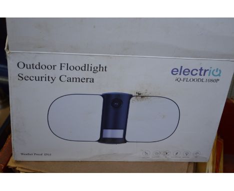 An outdoor flood light security camera.