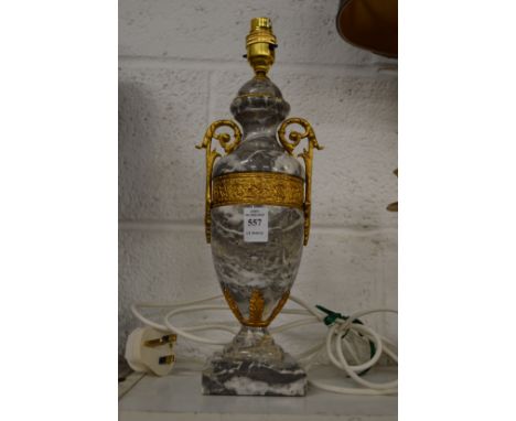 A marble and ormolu urn shaped table lamp.