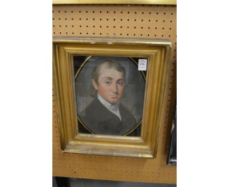 19th century bust length portrait of gentleman in a verre eglomise and giltwood frame.