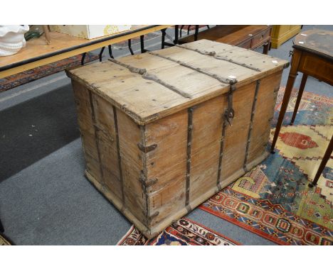 An Eastern iron bound teak trunk.