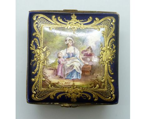 A late 19th Century French Sevres cobalt blue and gilt enamelled table snuff box, the top decorated with mother and children 