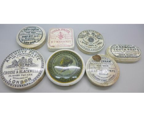 A collection of Victorian ceramic pot lids including Viola Paste, Anchovy Paste, Toothpaste and more