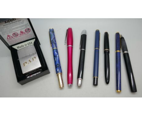 A collection of pens including Parker and a Zippo lighter  *THIS LOT IS NOT AVAILABLE FOR PACKING AND POSTING 