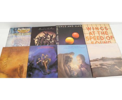 A mixed collection of LP records, including Band on The Run, The Moody Blues, The Rolling Stones, Cliff Richard, Simon &amp; 