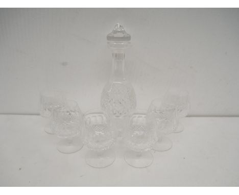 A box of Waterford cut crystal glassware including brandy glasses and various other sized liquor glasses, and a decanter **PL