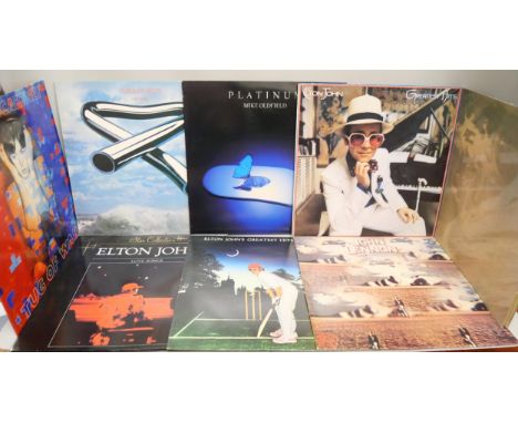 A mixed collection of LP records to include Elton John, Paul McCartney, Buddy Holly, the Monkees, Wings over America, Handel,