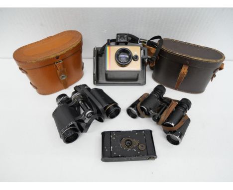 Two Sets of binoculars and two cameras including Polaroid Land Camera **PLEASE NOTE THIS LOT IS NOT ELIGIBLE FOR IN-HOUSE POS