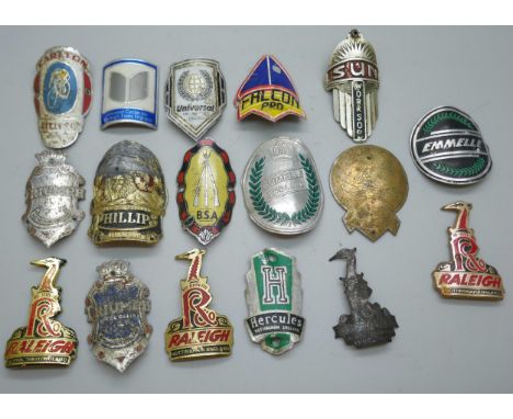 A collection of badges including Raleigh, Emelle and more