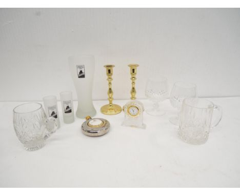 A collection of glassware, includes QEII farewell celebration 2008 pint glass, two shot glasses and a stainless steel hip fla
