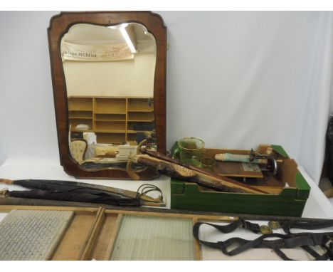 A walnut framed mirror, two washboards, one with glass panel and various other collectables.