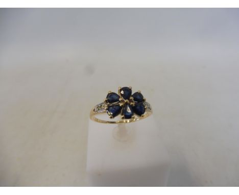 An Australian blue sapphire and diamond 9K gold ring, size R to S with authenticity certificate, approx 2.3g.
