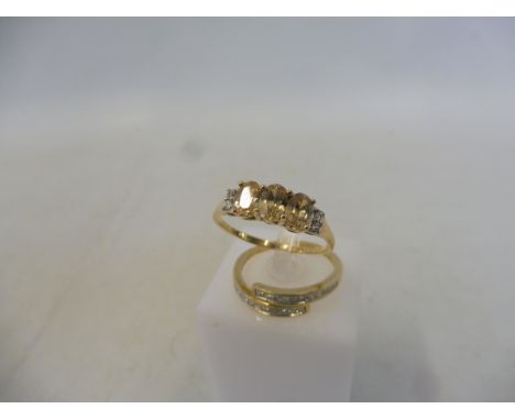 A 1/2ct diamond 9K gold Tomas Rae ring, size R to S, with authenticity certificate, approx 2.5g together with a second 9K gol