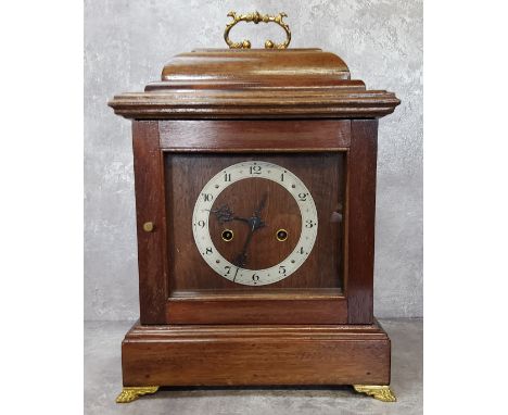 A Davall mahogany mantel clock, silver chapter ring, black Arabic numerals, two winding holes, gilt metal scroll swing handle