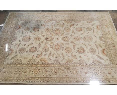 A substantial Persian Zeigler carpet, subtle hessian tones picked out in ocre and gold, 325cm x 242cm 