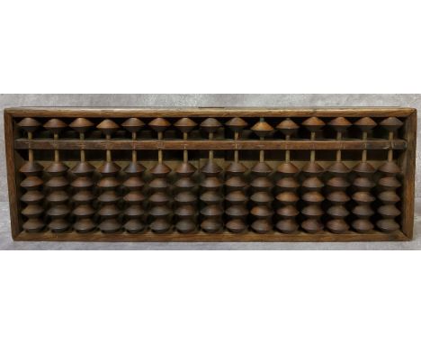 An early 20th century Chinese padouk wood abacus 33cm wide 