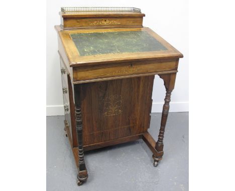 LATE VICTORIAN ROSEWOOD DAVENPORT DESK having brass gallery to lidded stationary compartment, inset writing surface, with two