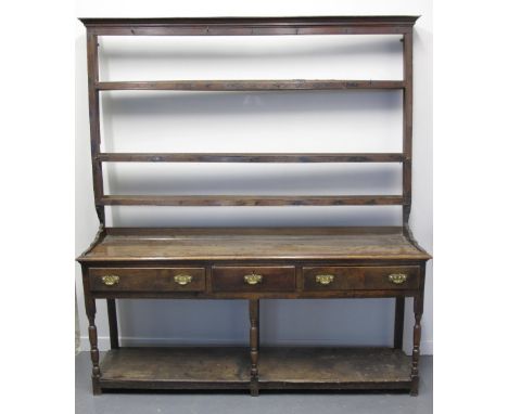 EARLY 19TH CENTURY WELSH OAK POT BOARD DRESSER having open three shelf rack back with moulded cornice, the base with moulded 