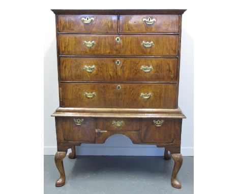 18TH CENTURY STYLE WALNUT STRAIGHT FRONTED CHEST of two short and three long graduated drawers on a projecting stand with an 