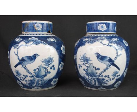 PAIR OF 19TH CENTURY CHINESE PORCELAIN BALUSTER SHAPED GINGER JARS AND COVERS in Kangxi style, decorated with reserved panels