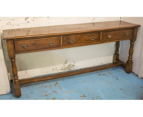 DRESSER BASE, Georgian style oak with three drawers, 75cm H x 179cm x 42cm.