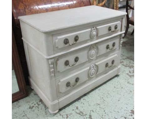 COMMODE, French 19th century distressed grey painted having three long drawers centred with carved roundels over a base drawe