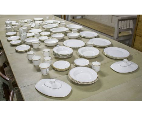DINNER SERVICE, Royal Doulton fine bone China gold white concorde pattern, twelve place nine piece setting including dinner, 