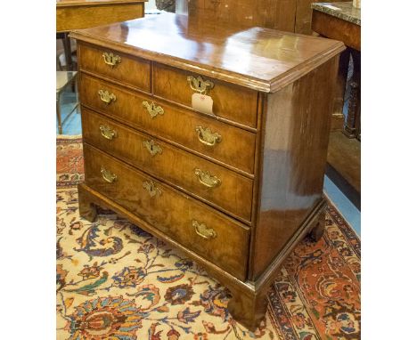 CHEST, early 18th century English Queen Anne figured walnut with two short and three long drawers, 84cm W x 54cm D x 81cm H.