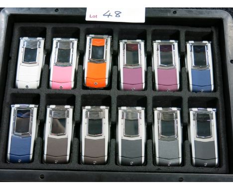 Archive Collection of 37 Vertu Constellation Ayxta Flip Phones made of Titanium, Stainless Steel, Ceramic Pillow, Sapphire Sc