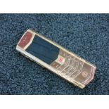 Vertu 18kt Red Gold Signature S Phone with Ruby Select Key. Furnished with Ceramic Pillow,