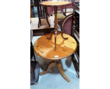 A pine tripod table and a mahogany wine table