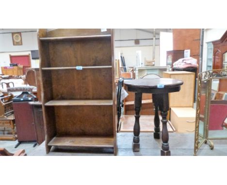 A small oak open bookcase and an occasional table on turned tripod support