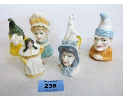 A group of modern Royal Worcester candle snuffers, owl; French Cook; Mrs Caudle; Mr Caudle; Punch and Mob Cap