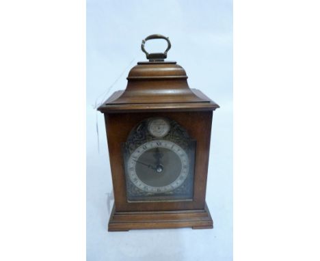 A mahogany bracket style clock of recent manufacture, the brass dial with spandrels and silvered chapter. 9'' high. Movement 
