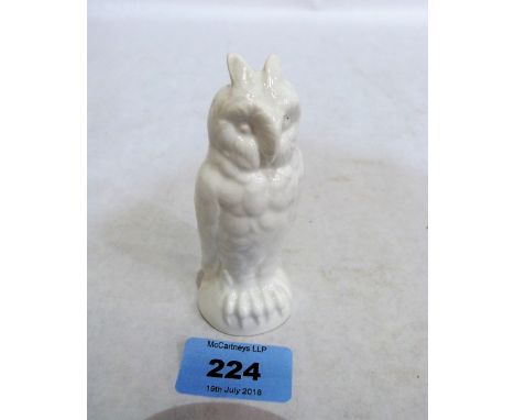 An owl candle snuffer, probably Royal Worcester, in white glaze. Unmarked
