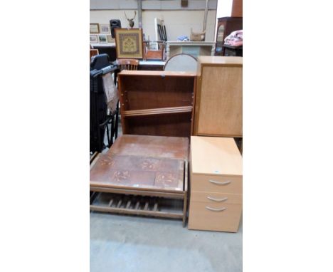 A Danish Silkeborg teak coffee table; another coffee table with tile top; a three drawer filing cabinet and a bookcase
