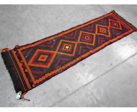 A Suzni kilim runner. 247cm x 68cm