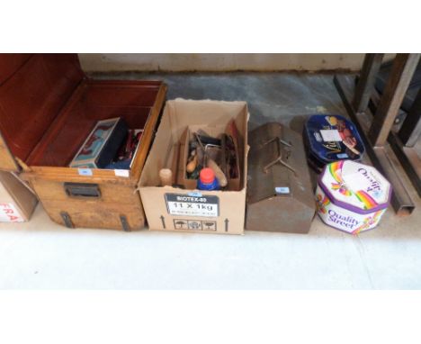 A collection of tools, nuts and bolts, drills, wood plane etc.