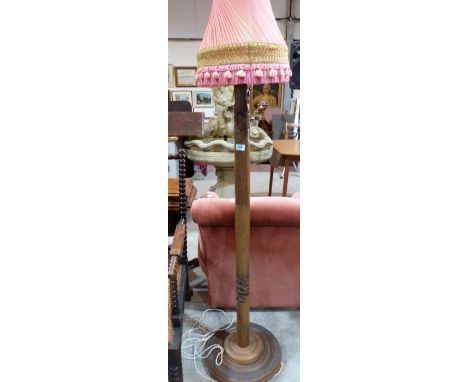A lamp standard, carved in chinoiserie style with pagodas and garden scenes