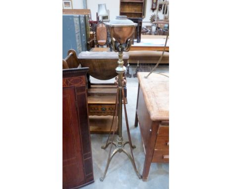 A late 19th century wrought brass and copper telescopic oil lamp standard