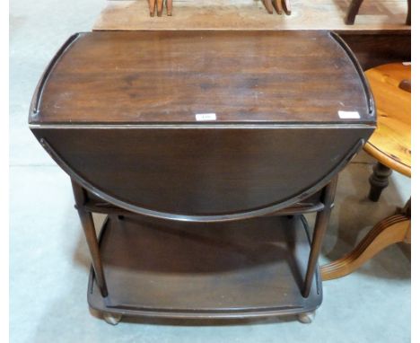An Ercol dropleaf three tier serving trolley