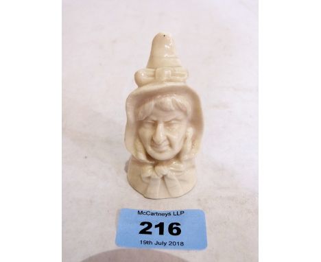 A Royal Worcester candle snuffer, Mrs Caudle, in white glaze. 1905