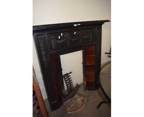 Cast iron and tiled fire surround with grate, overall approx 95cm wide