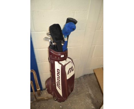Mizuno burgundy and cream golf caddy and a quantity of assorted clubs